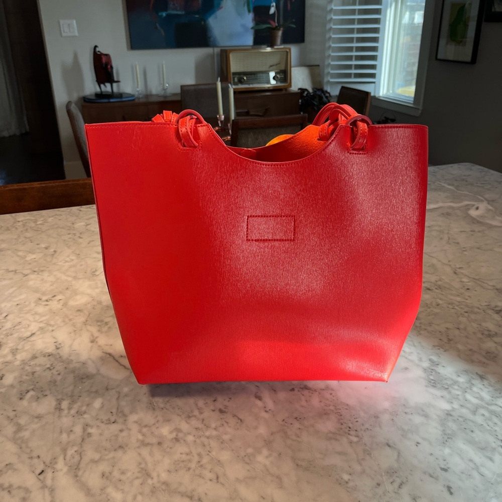 Orange bag from Neiman Marcus. - Picture 1 of 3